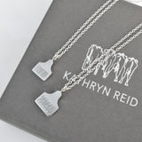 Cow Ear Tag Necklace in Sterling Silver