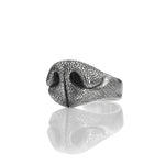 silver ring in the shape of a dog's nose